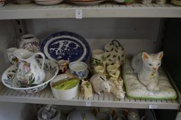 A quantity of decorative china to include a large pottery model of a cat on a cushion.