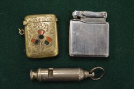 A whistle, vesta case and a cigarette lighter.