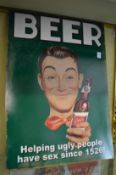 A novelty printed metal sign 'beer'.