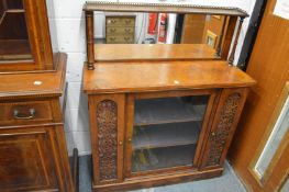 A mahogany and mulberry veneered chiffonier with galleried mirror back, central glazed door