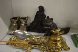 An ornate cast brass desk stand and other items.