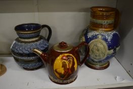 Two Royal Doulton jugs, one to commemorate Queen Victoria's Golden Jubilee together with a Doulton