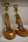 A pair of deers hoof candlesticks.