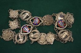 A decorative belt made up of various badges.