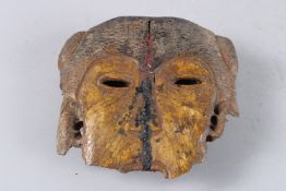 AN ANCIENT BONE FUNERAY MASK 6ins x 6ins
