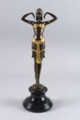 AFTER D. H, CHIPARUS. A BRONZE AND GILT DANCING GIRL. Signed. 13ins high, on a circular marble