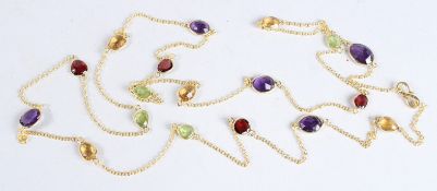 A SILVER GILT GEMSTONE NECKLACE. 120cms long.