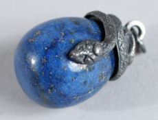 A SILVER LAPIS SNAKE EGG PENDANT.