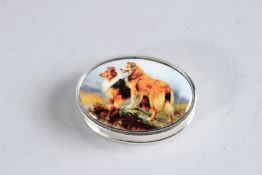 A SILVER OVAL PILL BOX with two 'Lassie' dogs.