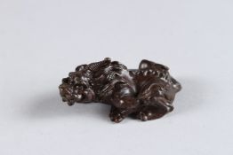 A JAPANESE BRONZE FOO DOG. 2ins.