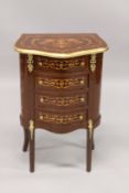 A LOUIS XVI STYLE INLAID FOUR DRAWER BEDSIDE CHEST on curving legs. 2ft 4ins high x 1ft 7ins wide.