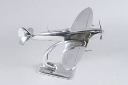 A CHROME SPITFIRE on stand. 9ins high.
