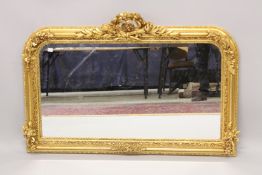 A GOOD LOUIS XVI STYLE GILTWOOD OVERMANTLE MIRROR with quiver and scrolls. 4ft 7ins high x 2ft