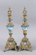 A PAIR OF SEVRES DESIGN PORCELAIN AND METAL SIDE PIECES. 18ins high.