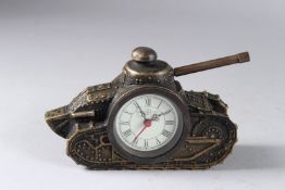 A NOVELTY METAL TANK CLOCK. 6ins.