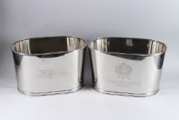 A PAIR OF BOLLINGER WINE COOLERS. 17ins long x 10ins high.