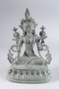 A VERDIGRIS BRONZE TARA FIGURE. 9ins high.