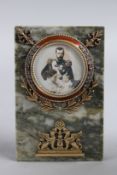 A SUPERB RUSSIAN MOTTLED JADE, ENAMEL AND GILT PHOTOGRAPH FRAME on a stand. 4.5ins high.