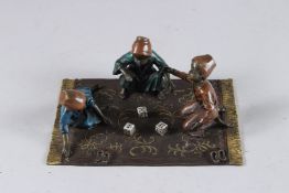 A VIENNA BRONZE, TWO ARAB BOYS PLAYING A GAME OF DICE. 7ins high.
