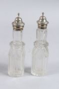TWO GEORGIAN SILVER TOP CRUET BOTTLES.