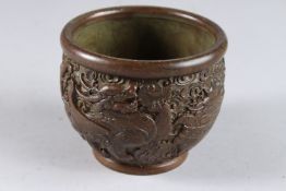 A CHINESE BRONZE GILDED CIRCULAR CENSER. 2.75ins.