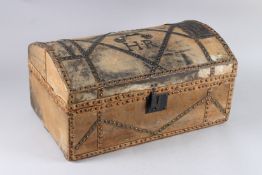 AN EARLY 19TH CENTURY HIDE SKIN COVERED TRUNK with domed top and studs and initials H. R. 1ft 8ins