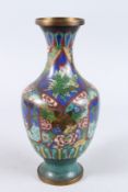 A CLOISONNE ENAMEL VASE with panels of deer.