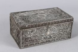 AN ISLAMIC SILVER JEWELLERY BOX. 8.5ins long.