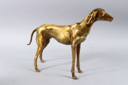 A BRONZE DOG. 11ins high.