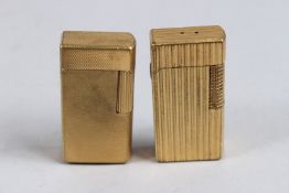 TWO DUNHILL GAS LIGHTERS.