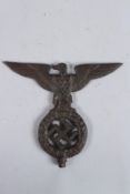 A CAST IRON NAZI EMBLEM. 6ins long.
