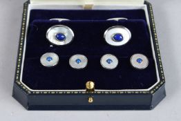 A STERLING SILVER, LAPIS AND MOTHER-OF-PEARL STUD SET.