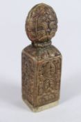 A TIBETAN BRONZE SEAL. 4.5ins high.