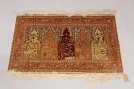 A FINE RECTANGULAR PERSIAN SILK RUG with five panels of birds, deer, lion, flowers and trees. 2ft