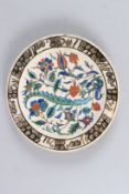 AN ISLAMIC CIRCULAR PLATE. 10ins diameter.