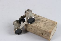 A PAIR OF SHAGREEN AND METAL OPERA GLASSES in a Shagreen case.