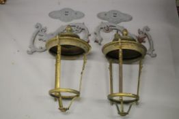 A PAIR OF LARGE BRONZE WALL LIGHTS, of tapering circular form, unglazed, complete with a pair of