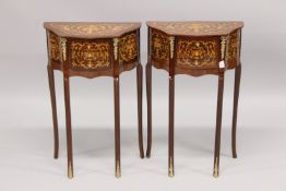 A PAIR OF LOUIS XVI STYLE SHAPED FRONT BEDSIDE TABLES with three drawers, on curving legs. 2ft
