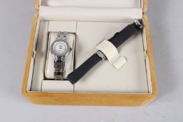 A TECHNOMARINE WRISTWATCH in a box.