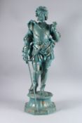 A LARGE 19TH CENTURY SPELTER CAVALIER carrying a sword, on an octagonal base. 32ins high.