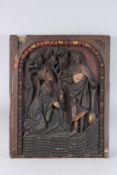 AN 18TH CENTURY CARVED WOODEN PANEL depicting in relief, MARY MAGDALENE and CHRIST. 29ins x 23ins.