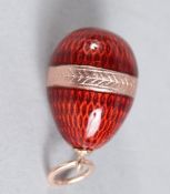 A RUSSIAN ENAMEL EGG PENDANT.