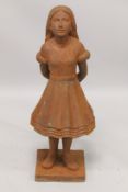 A LARGE CAST IRON FIGURE OF ALICE IN WONDERLAND. 3ft 2ins high.