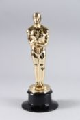 A REPLICA OSCAR AWARD. 13ins high.