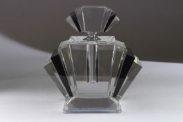 A LARGE BLACK ART DECO DESIGN SCENT BOTTLE AND STOPPER. 9ins high.