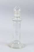 A PLAIN VICTORIAN CUT GLASS JAR AND STOPPER. 13ins high.