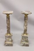 A PAIR OF CLUSTER COLUMN MARBLE STANDS. 5ft 4ins high.