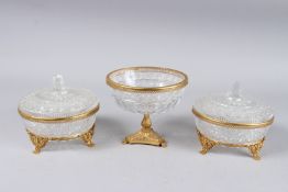 A PAIR OF CUT GLASS CIRCULAR BOWLS AND COVERS, 6ins diameter, and a comport, 6ins diameter (3).