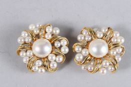 A GOOD PAIR OF TIFFANY & CO 18CT GOLD AND PEARL EAR CLIPS.