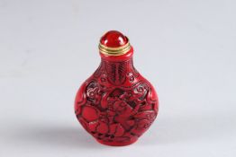 A CINNABAR SNUFF BOTTLE.